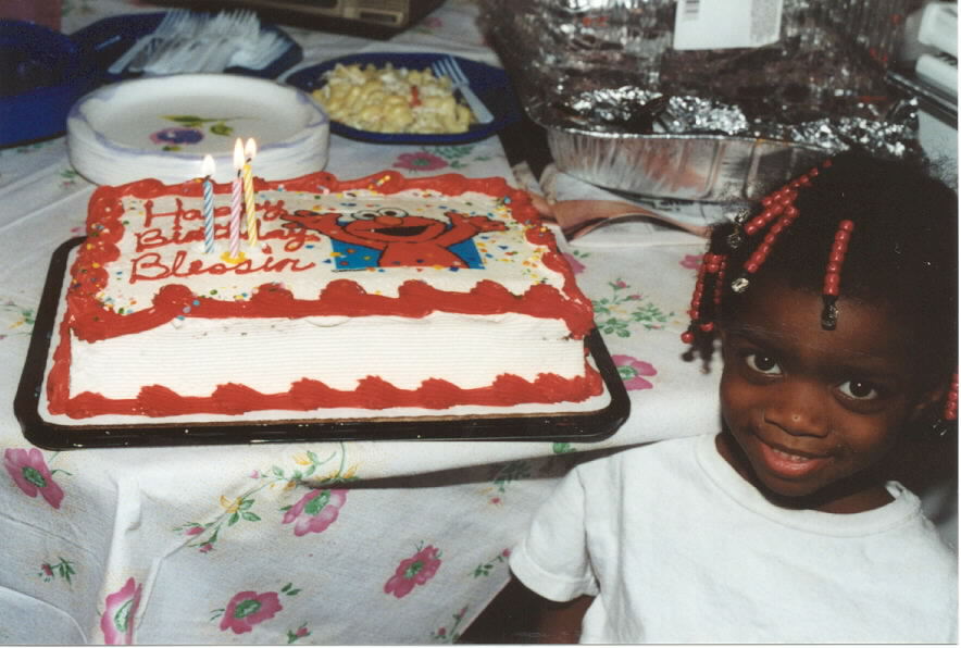 Cake and beads match on three candled cake.