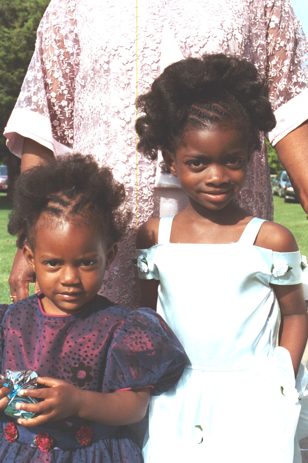Just after vows Fortune and Blessin in dresses made by their Grandmother Brooks.